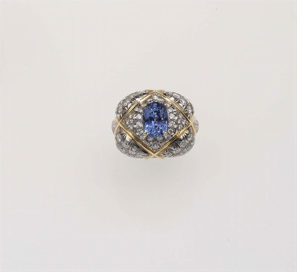 Sapphire, diamond, gold and platinum ring. David WEBB