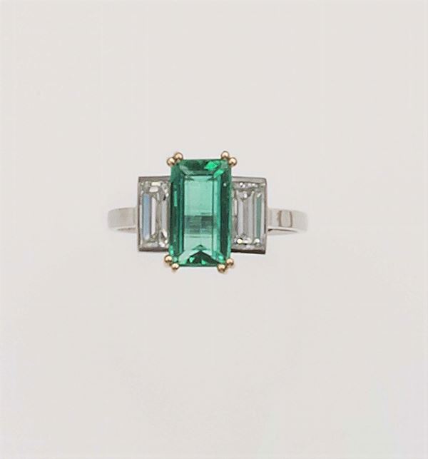 Emerald and diamond ring, monture Cartier Paris. Fitted case