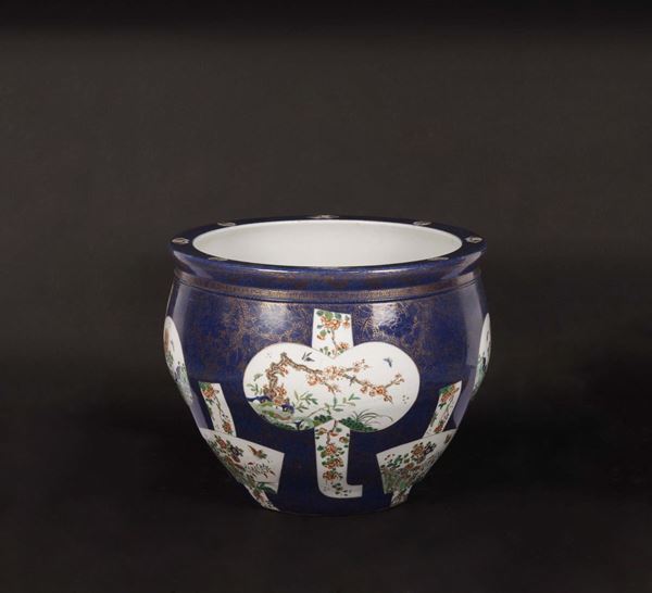 A Famille-Verte cachepot with naturalistic decoration within reserves, China, Qing Dynasty, 19th century