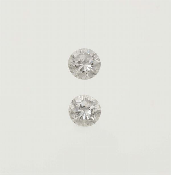 Two unmounted brilliant-cut diamonds weighings 0.90 and 0.91 carats