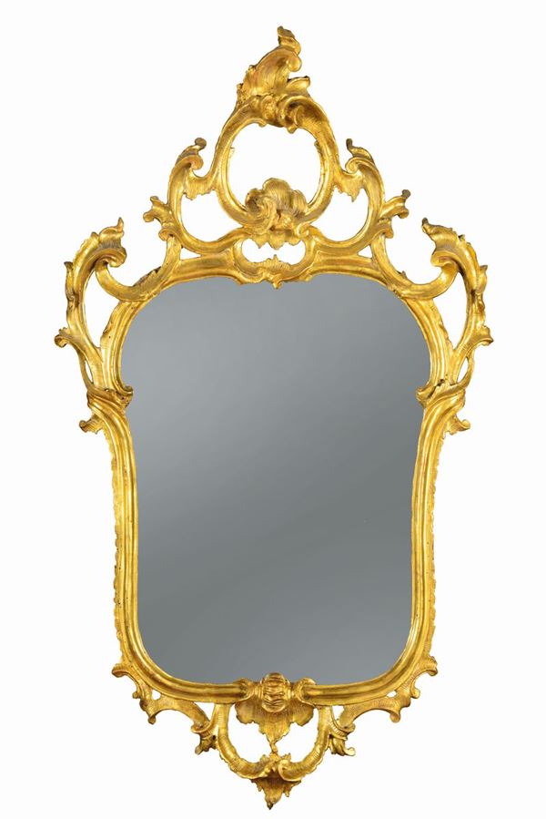 A series of four Louis XV mirrors in carved and gilded wood, Lombardy, half of the 18th century