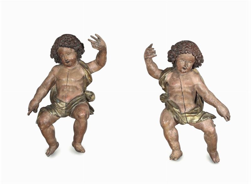 A pair of putti in polychrome and gilded wood. Baroque art, Austria or southern Germany, 17th century  - Auction Sculpture and Works of Art - Cambi Casa d'Aste