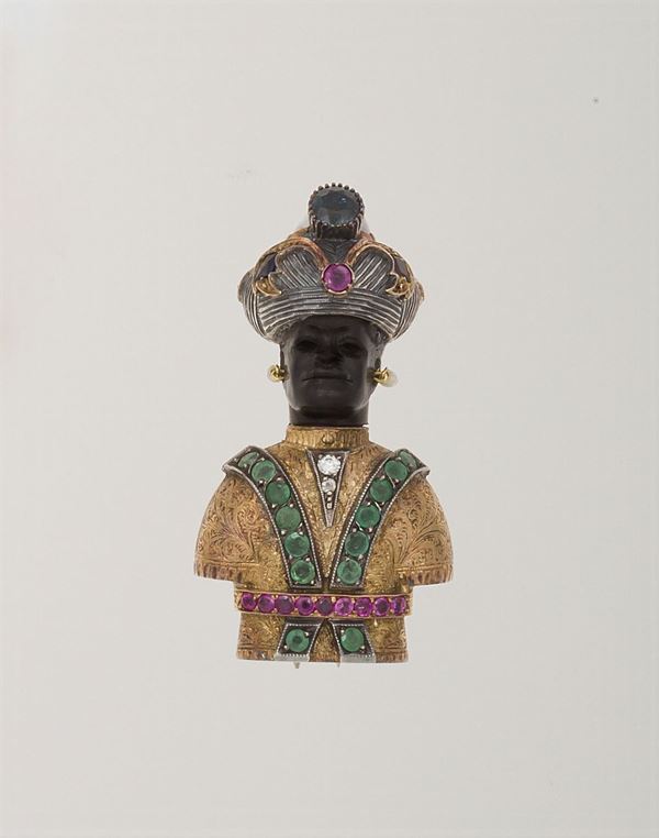 Etruscan’ style Venetian blackamoor in gold and silver with emeralds,rubies, diamonds and semi-precious stones. 1940s – 1950s