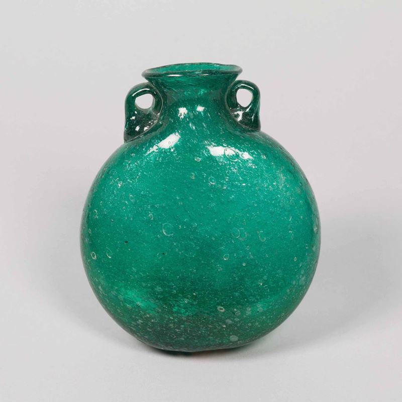 Napoleone Martinuzzi, Murano, 1930 ca. A flask in green glass with applied handles  - Auction Murano '900 - II - Cambi Casa d'Aste