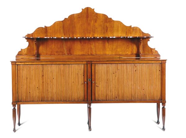 A sideboard with sliding shutters, in cypress wood, top in blonde mahogany and upper part in cherry wood. Neoclassical Senese cabinet-maker, likely on a project by Agostino Fantastici, Siena, first half of the 19th century