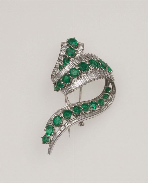 Emerald, diamond and platinum brooch