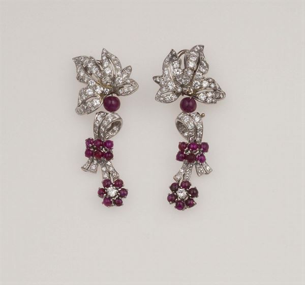 Pair of ruby, diamond and platinum earrings
