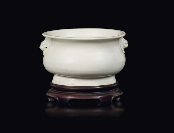 A Blanc de Chine Dehua porcelain censer with mask handles, China, Qing Dynasty, Kangxi Period (1662-1722)