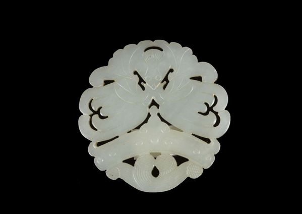 A fretworked white jade plaque with bat, China, Qing Dynasty, 19th century