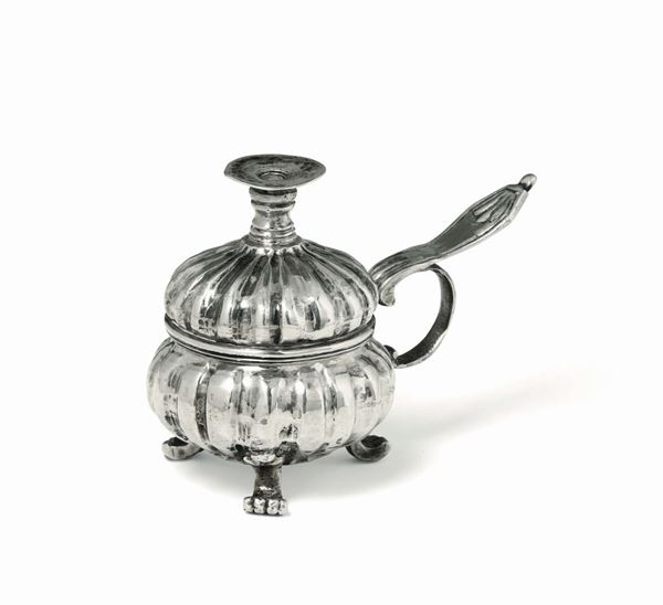 A wick holder in molten and embossed silver, Venice, second half of the 18th century, city's guarantee mark and other unidentified stamp.