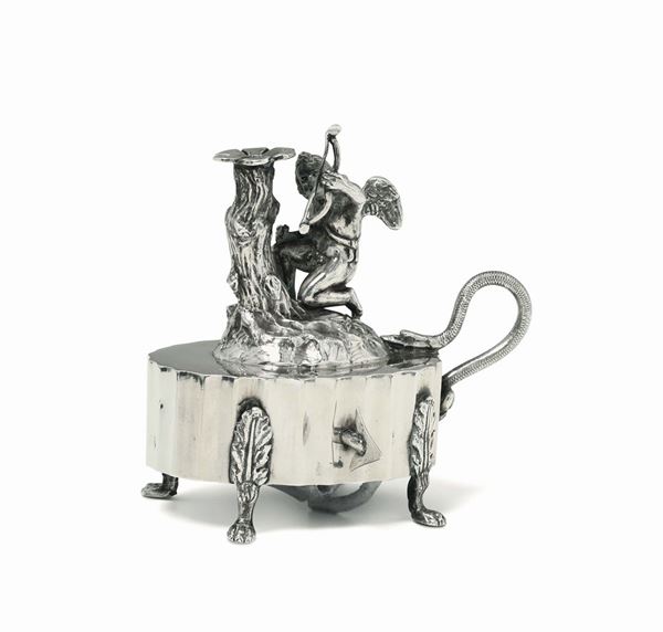 A silver holder in molten, embossed and chiselled silver, Rome, 19th century, cameral stamp.