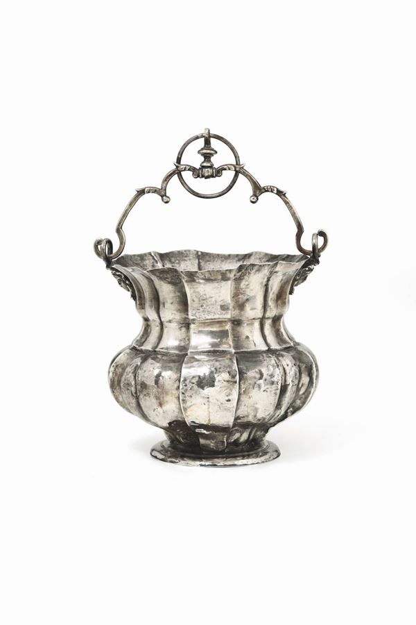 A bucket in molten, embossed and chiselled silver, Naples 1747, city's guarantee stamp.