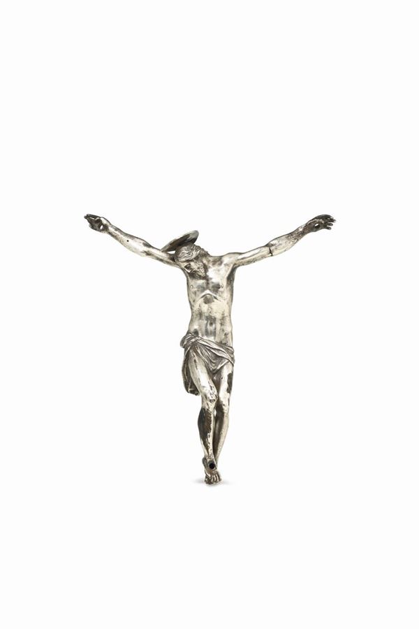 A crucified Christ in molten and chiselled silver, Venice 18th century, city's guarantee stamp.