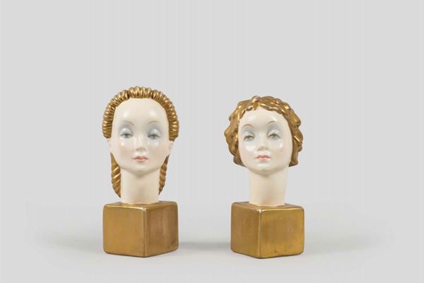 Elena Konig Scavini, Lenci, Torino, 1930 ca. A lot made up by two heads on squared stands in modelled earthenware ceramics, depicting the goddess Calypso and a boy's head