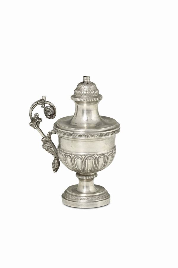A wicker holder in molten, embossed and chiselled silver, Florence, half of the 19th century, city's stamp (Marzocco)