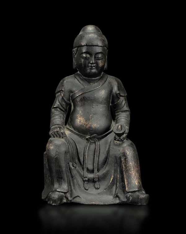A semi-gilt bronze figure of dignitary, China, Ming Dynasty, 17th century