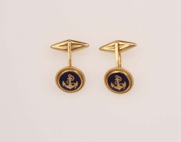 Pair of gold and enamel cufflinks. Fitted case