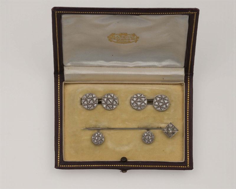 Platinum and diamond dress-set. Pounch stamped Massoni, Rome  - Auction Fine Jewels - Cambi Casa d'Aste