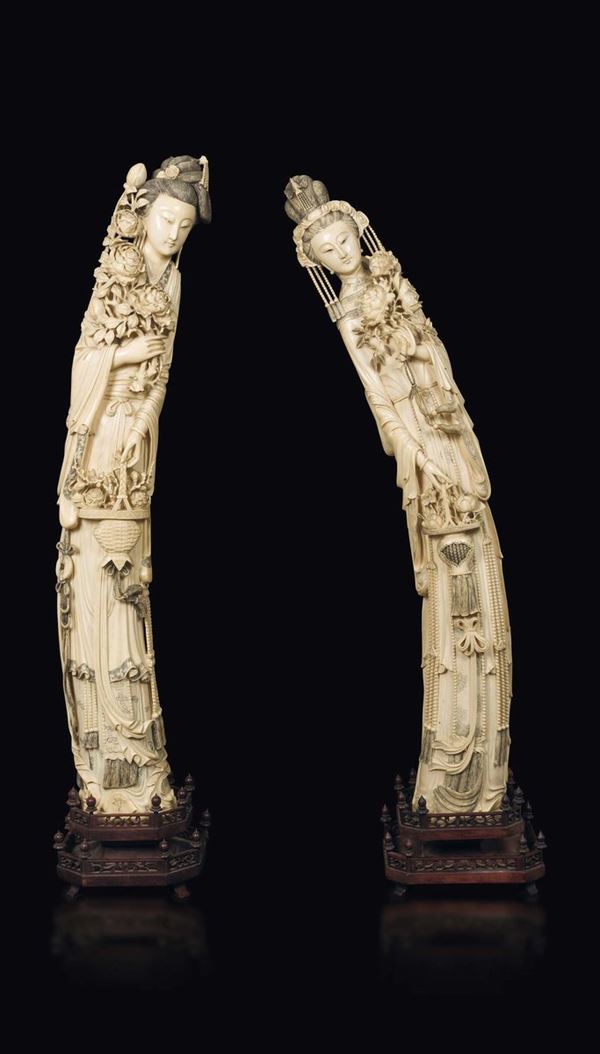 Two large carved ivory figures of Guanyin with roses and flower pot, China, Qing Dynasty, 19th century