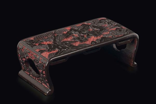 A lacquered wood shelf with schoolars, China, Qing Dynasty, 19th century
