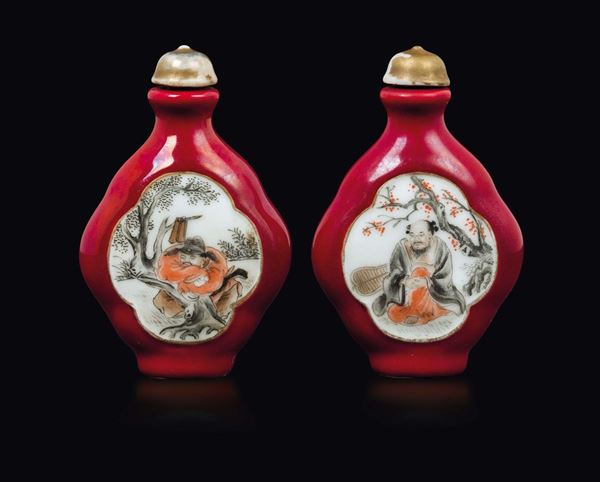 A pair of red-ground porcelain snuff bottles with wisemen and inscriptions within reserves, China, Qing Dynasty, 19th century