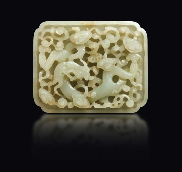 A white jade plaque with naturalistic decoration in relief, China, Yuan Dynasty (1279-1368)