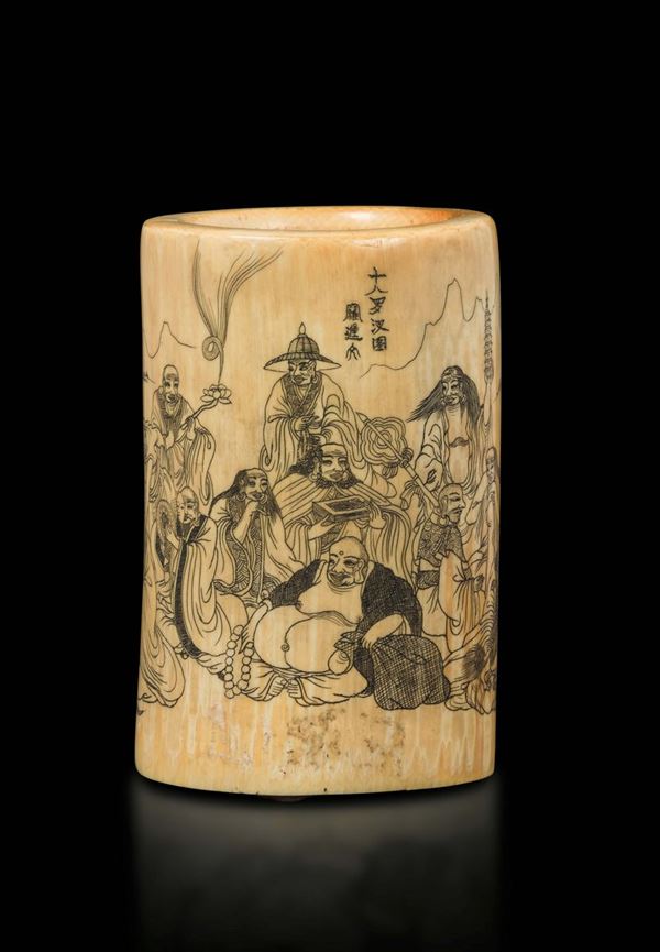 A carved ivory brushpot with eighteen Luohan and inscription, China, Qing Dynasty, 19th century