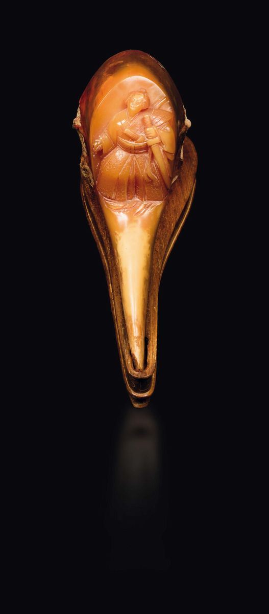 A carved toucan beak with figure of warrior, China, Qing Dynasty, 19th century