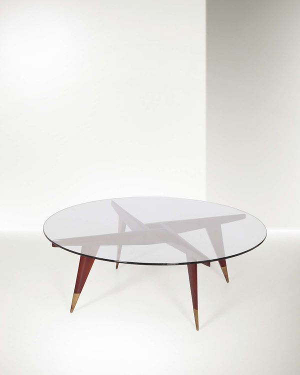 Gio Ponti, a coffee table with a wooden structure and brass details. Crystal top. Original certificate  [..]