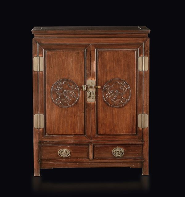 A homu wooden cabinet with small dragons, China, Qing Dynasty, 19th century