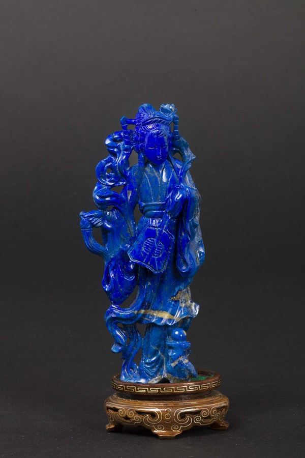 A small lapis lazuli figure of Guanyin with fan, China, early 20th century