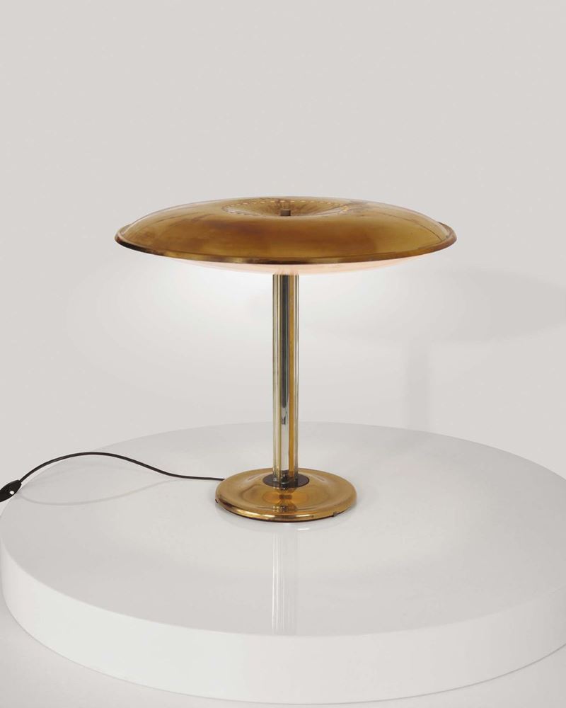 Pietro Chiesa, a rare table lamp in polished brass with a cut glass shaft and a shade in satin-finished glass. Fontana Arte, Italy, 1948 cm 56x50  Bibliography: R. Aloi, L’Arredamento Moderno terza edizione,  g. 129, Hoepli, 1948.  - Auction Fine design - Cambi Casa d'Aste