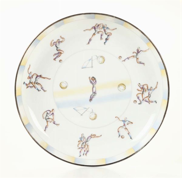 Gio Ponti, Richard Ginori, Sesto Fiorentino, 1930 ca. A porcelain plate with a polychrome decor of football players, gilded edge