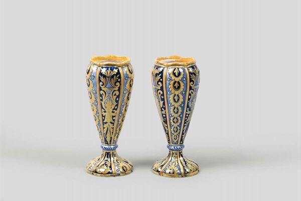 Gualdo Tadino, Italy, 19th century. A pair of terracotta vases with a strongly iridescent polychrome decor of natural elements