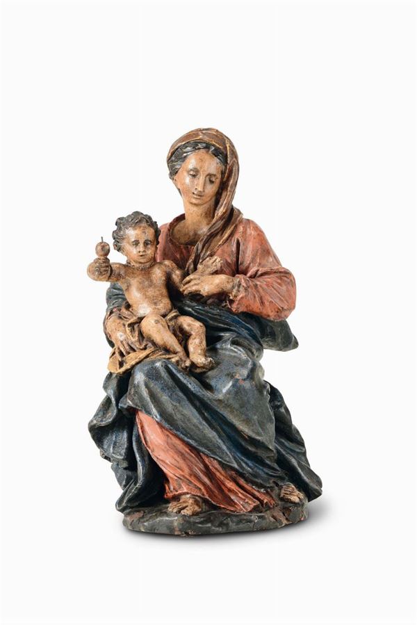 A Madonna with Child in polychrome terracotta. From the circle of Giuseppe Maria Mazza (1653 - 1741), Italy 17th-18th century