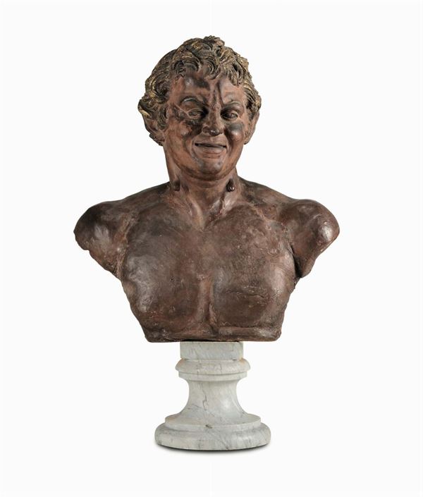 A Faun Albani bust in terracotta. Italian modeller from the 18th century