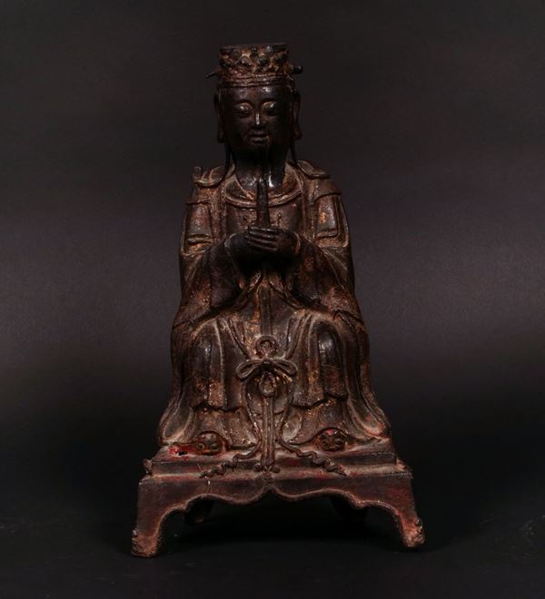 A bronze figure of seated dignitary, China, Ming Dynasty, 17th century