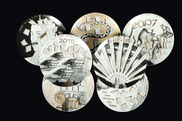 Fornasetti, Milano, 1990s. Seven plates from the Calendario series, 1990 to 2017, in decorated porcelain