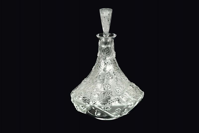 Lalique, France, 19th century. A blown crystal bottle with a decor of leaves and fruits, sanded and in relief  - Auction 20th Century Decorative Arts - I - Cambi Casa d'Aste