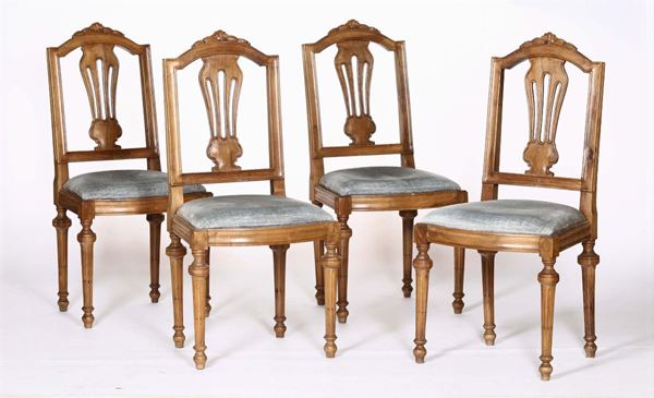 Quattro sedie in stile Luigi XVI in noce, XIX secolo
