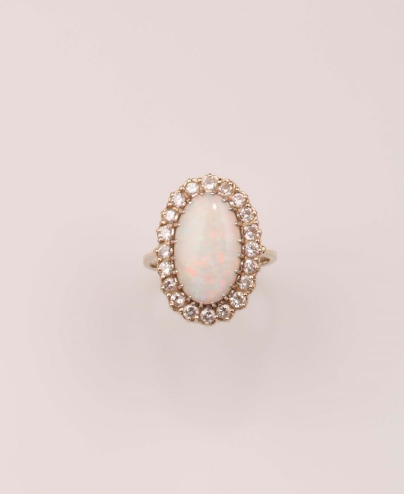 Anello con opale taglio ovale e diamanti a contorno  - Asta Vintage, Gioielli e Orologi - Cambi Casa d'Aste