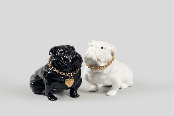 Fornasetti shop, Milano, 1970 ca. A pair of earthenware ceramic dogs with gilded brass collars