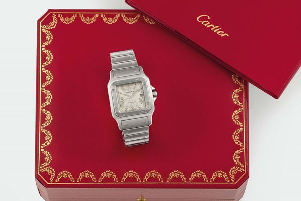 Cartier, Santos, Automatic, Ref. 2319. Fine, square, center seconds, self-winding, water-resistant, stainless steel wristwatch with date and a stainless steel Cartier Santos bracelet with double deployant clasp. Accompanied by the original box and Guarantee. Made circa 2000