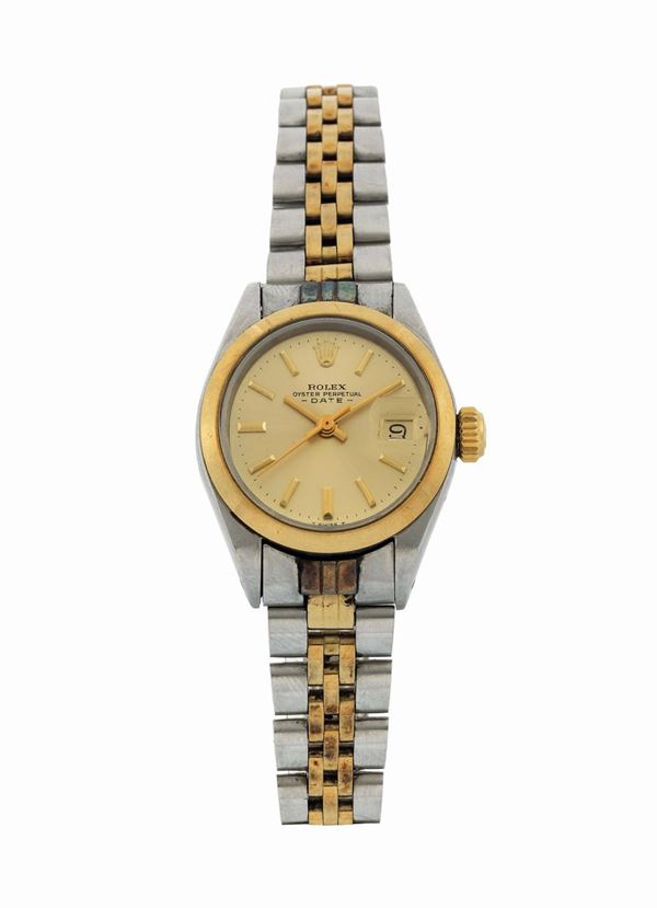 Rolex, Oyster Perpetual Date, Ref. 6916. Fine, self winding, water resistant, stainless steel and gold wristwatch with date and an original bracelet with deployant clasp. Made circa 1970