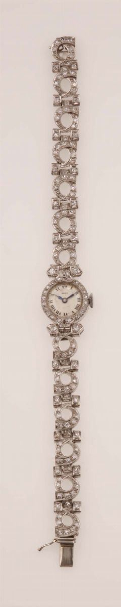 A lady's platinum and diamond-set bracelet watch