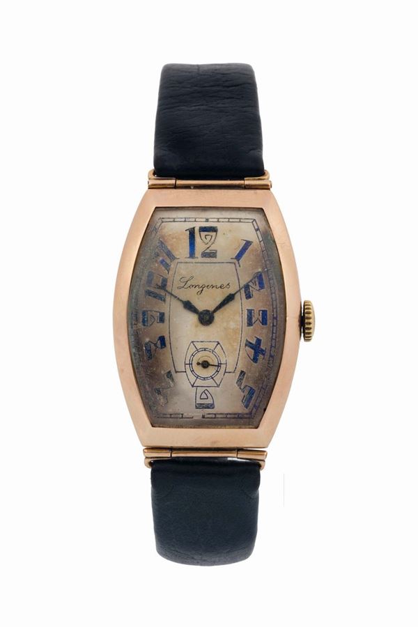 LONGINES, 18K pink gold curved wristwatch. Made circa 1920