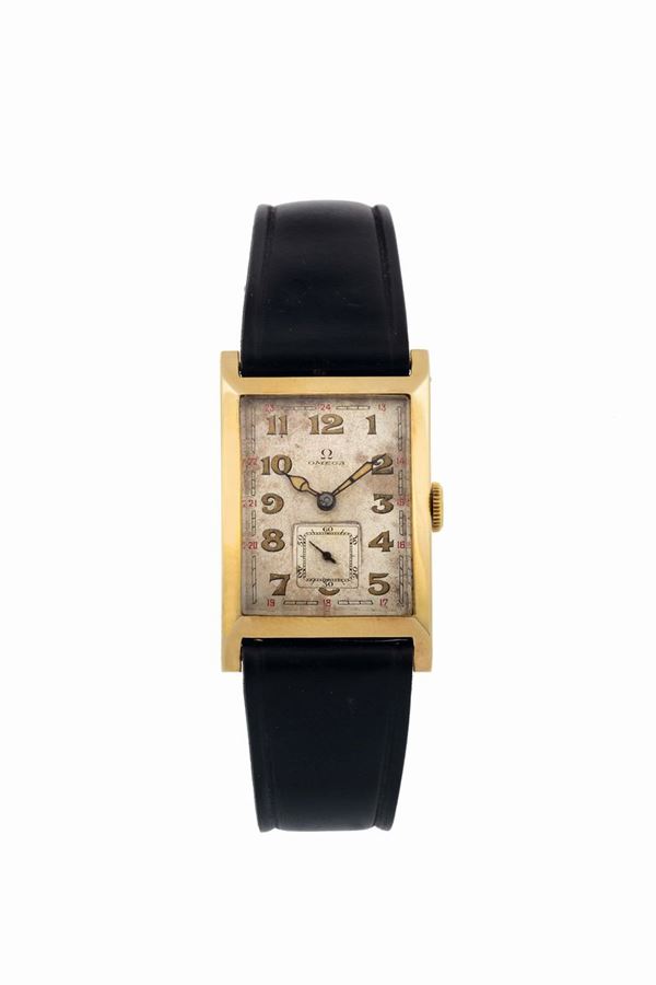 Omega,Art Decò, movement No. 6984437. Fine, rectangular, 14K yellow gold wristwatch with original gold plated buckle. Made circa 1920