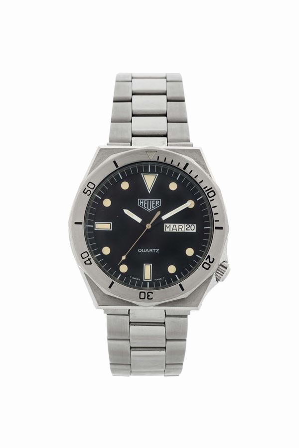 HEUER, Quartz, Ref.3696. Fine, water resistant, quartz, stainless steel wristwatch with day/date and a stainless steel original bracelet with deployant clasp. Made circa 1980