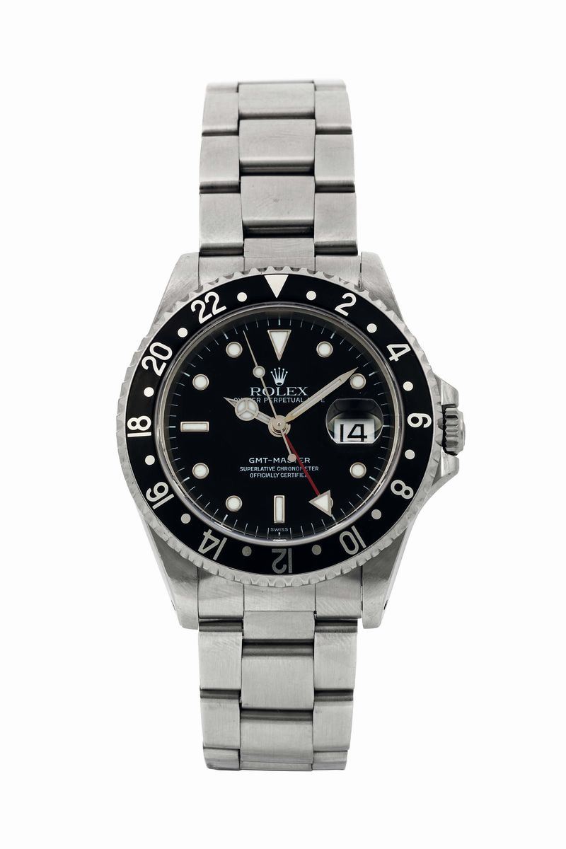 ROLEX,  Oyster Perpetual Date, GMT-Master, Superlative Chronometer, Officially Certified , Ref. 16700, Case No. U968025.  Fine, two time zone, center seconds, self-winding, water-resistant, stainless steel  wristwatch with date, revolving black 24-hour bezel and a stainless steel Oyster Fliplock bracelet. Made in 1998.  - Auction Watches and Pocket Watches - Cambi Casa d'Aste