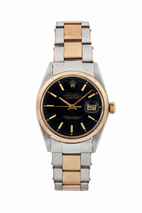 Rolex, Oyster Perpetual, DateJust, Superlative Chronometer, Officially Certified, Ref. 1600. Fine, center seconds, self-winding, water-resistant, tonneau-shaped, stainless steel and 18K pink gold wristwatch with an 18K pink gold and steel Rolex riveted Oyster bracelet with deployant clasp. Made circa 1960.